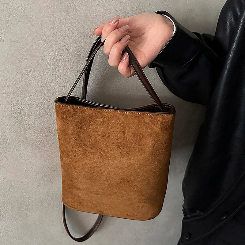 Damen Mini-Handtasche aus weichem Wildleder mit schickem Tragegriff Nord Taschen