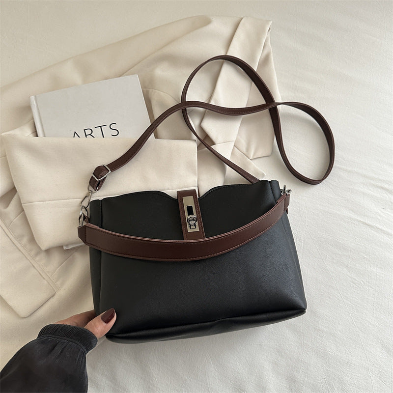 Damen elegante Umhängetasche mit hochwertiger Lederstruktur und modischem Verschluss Nord Taschen