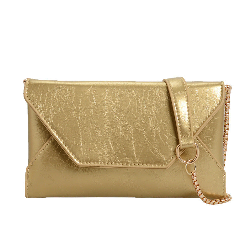 Damen elegante Clutch-Tasche mit glänzender Oberfläche und Kettenakzent Nord Taschen