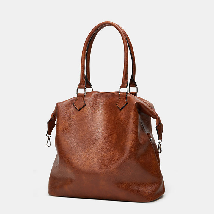 Damen Handtasche mit verstellbarem Schulterriemen und eleganter Lederstruktur Nord Taschen