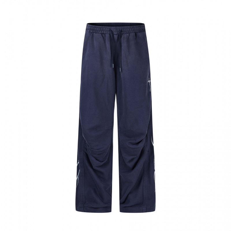 Herren weite Sweatpants im Baggy‑Cut mit Elastikbund, Kordelzug und geraffter Kniepartie Nord Taschen