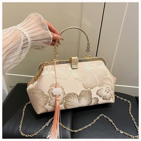 Damen elegante Clutch-Tasche mit floralem Druck und goldenen Akzenten Nord Taschen