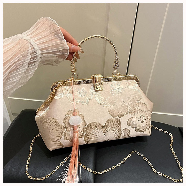 Damen elegante Clutch-Tasche mit floralem Druck und goldenen Akzenten Nord Taschen