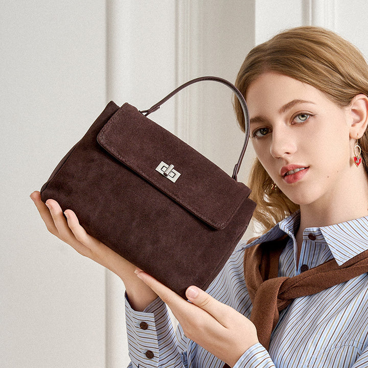 Damen samtige Handtasche mit edel glänzendem Verschluss Nord Taschen