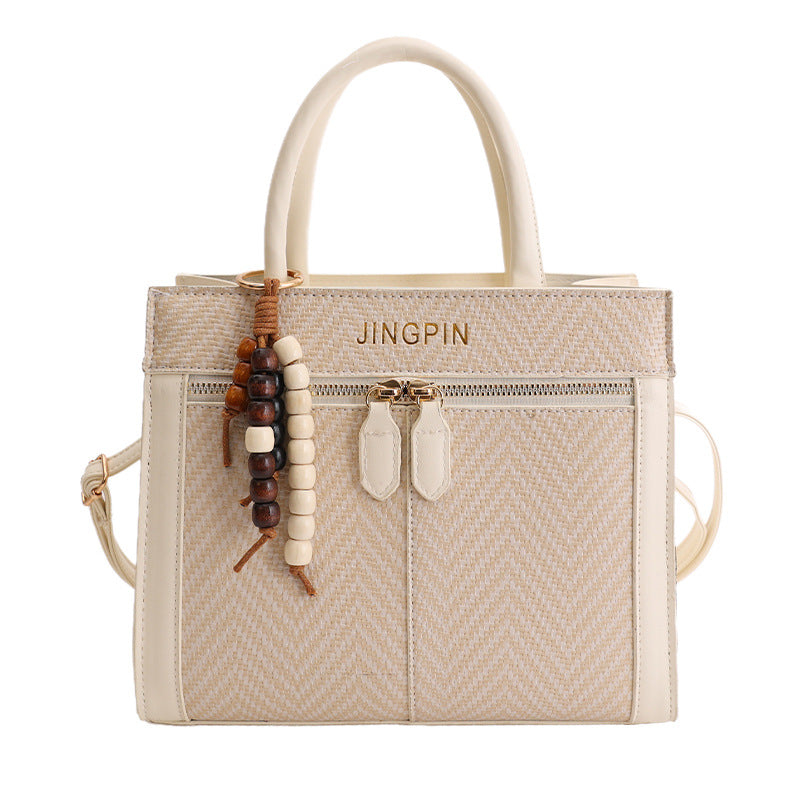 Damen elegante Struktur-Handtasche mit modischem Anhänger Nord Taschen