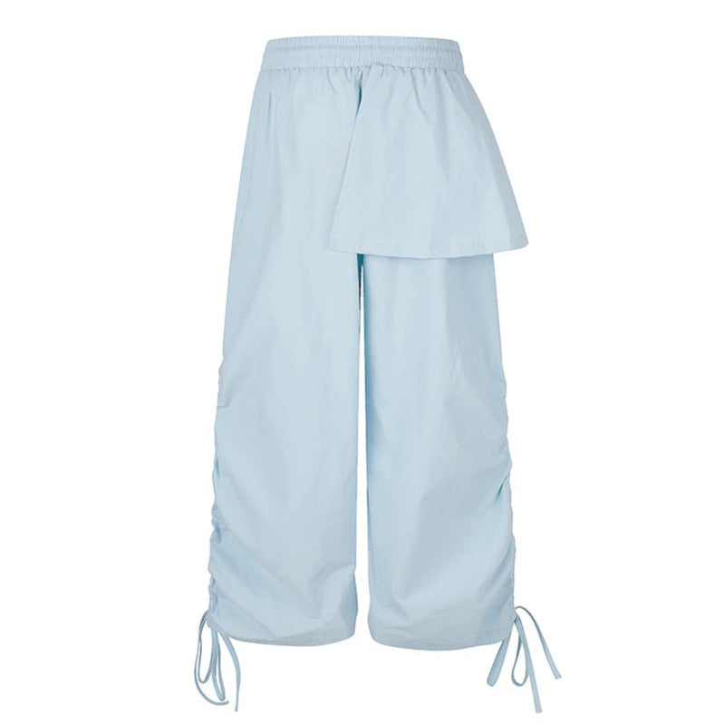 Damen Weite Capri-Hose mit Tunnelzug, seitlicher Raffung und asymmetrischer Überlagerung Nord Taschen