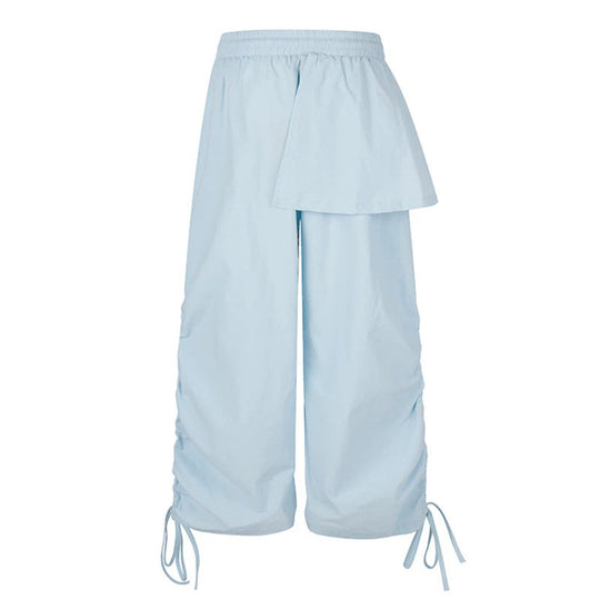 Damen Weite Capri-Hose mit Tunnelzug, seitlicher Raffung und asymmetrischer Überlagerung Nord Taschen