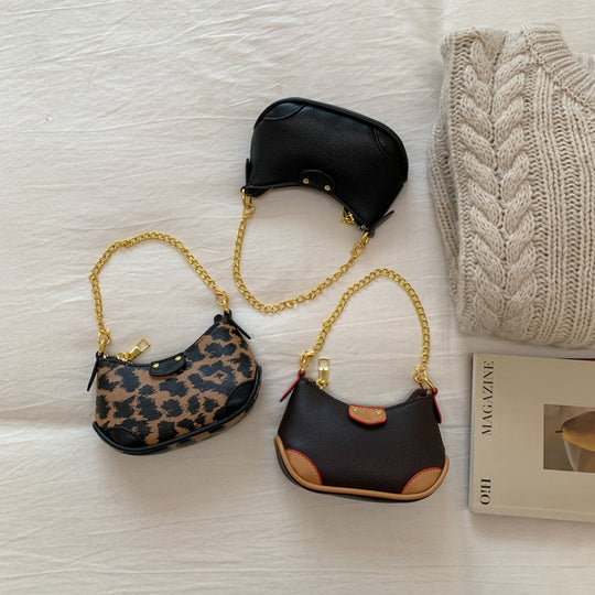 Damen Umhängetasche mit stilvollem Leopardenmuster und goldenen Akzenten Nord Taschen