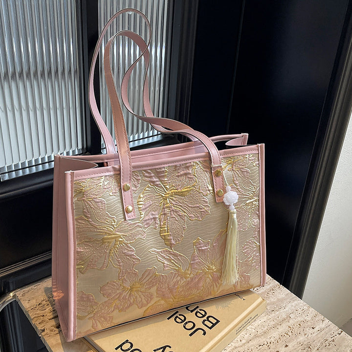 Damen Tragetasche mit floralem Stickdesign und elegantem Quastenanhänger Nord Taschen