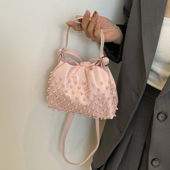 Damen Schultertasche mit strukturiertem Design und dekorativen Perlen Nord Taschen