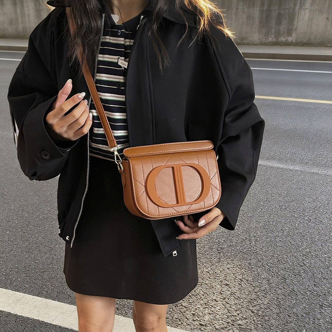 Damen Umhängetasche aus strukturiertem Kunstleder mit stilvollem Logo Nord Taschen