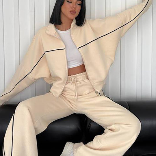 Damen lässiges Sweatset mit Stehkragen Reißverschluss gekürzter Jacke und hochtaillierter Schlaghose Nord Taschen