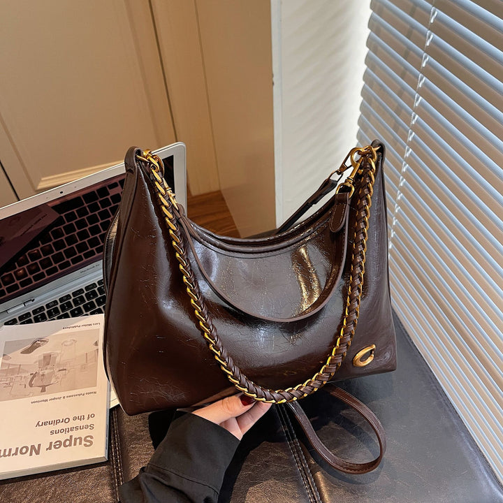 Damen elegante Handtasche mit Kettenakzenten Nord Taschen