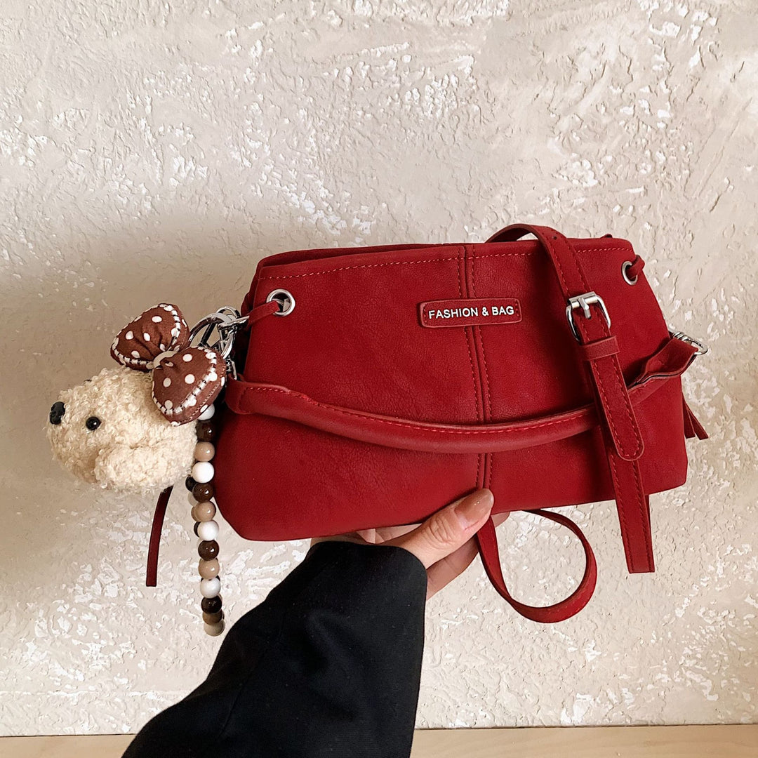 Damen Umhängetasche mit charmantem Tieranhänger Nord Taschen