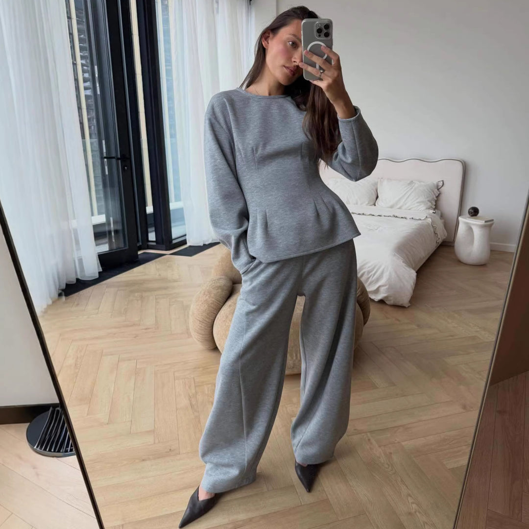 Damen Tailliertes Peplum-Oberteil mit Wiener Nähten und weitem Lounge-Hosen-Set Nord Taschen