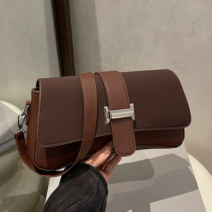 Damen elegante Umhängetasche mit hochwertiger Lederoberfläche und stilvollem Verschluss Nord Taschen