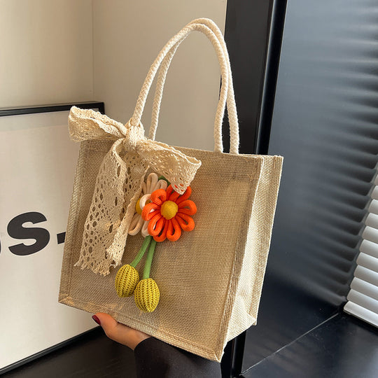 Damen Jute-Strandtasche mit floralem Dekor und verspieltem Schleifenakzent Nord Taschen