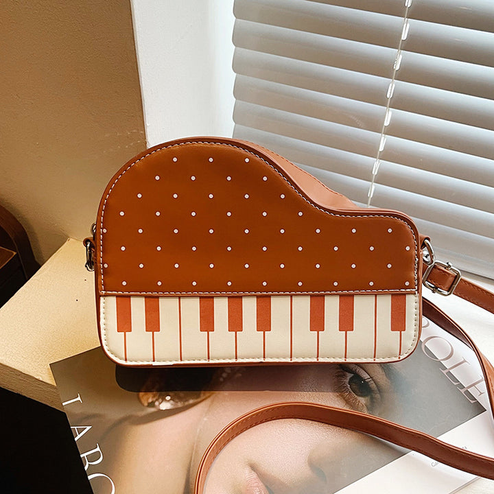 Damen Clutch-Tasche mit verspieltem Klavier-Design Nord Taschen
