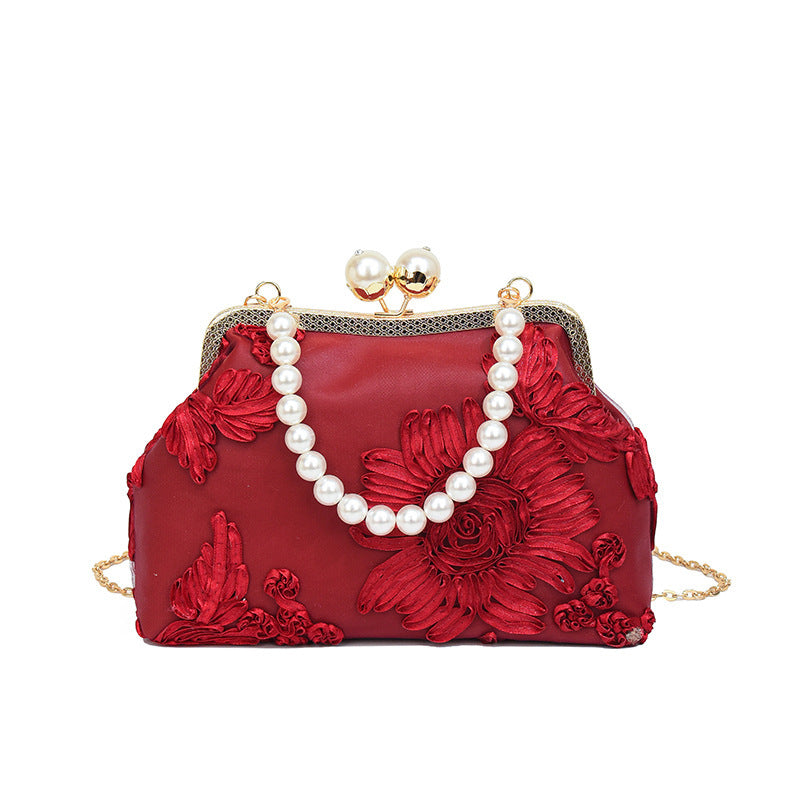 Damen elegante Clutch mit floralen Stickereien und Perlenakzenten Nord Taschen