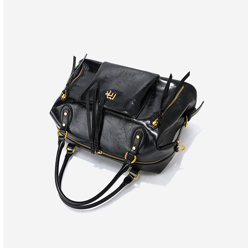 Damen elegante Handtasche mit goldenen Details Nord Taschen