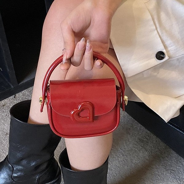 Damen Umhängetasche mit herzförmiger Applikation Nord Taschen