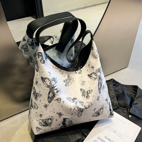Damen Hobo-Tasche mit floralem Schmetterlingsmotiv Nord Taschen