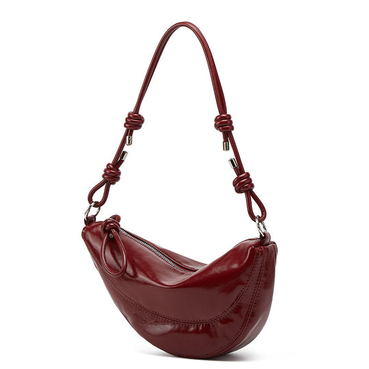 Damen Hobo-Tasche mit geschmeidiger Oberfläche und goldenen Verzierungen Nord Taschen