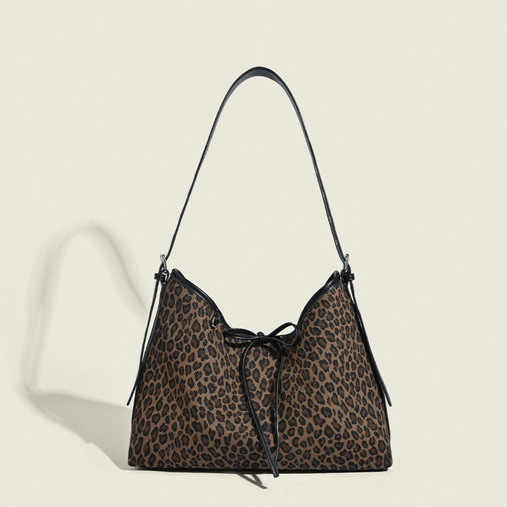 Damen Hobo-Tasche mit tierischem Muster und eleganter Kordelzugverzierung Nord Taschen