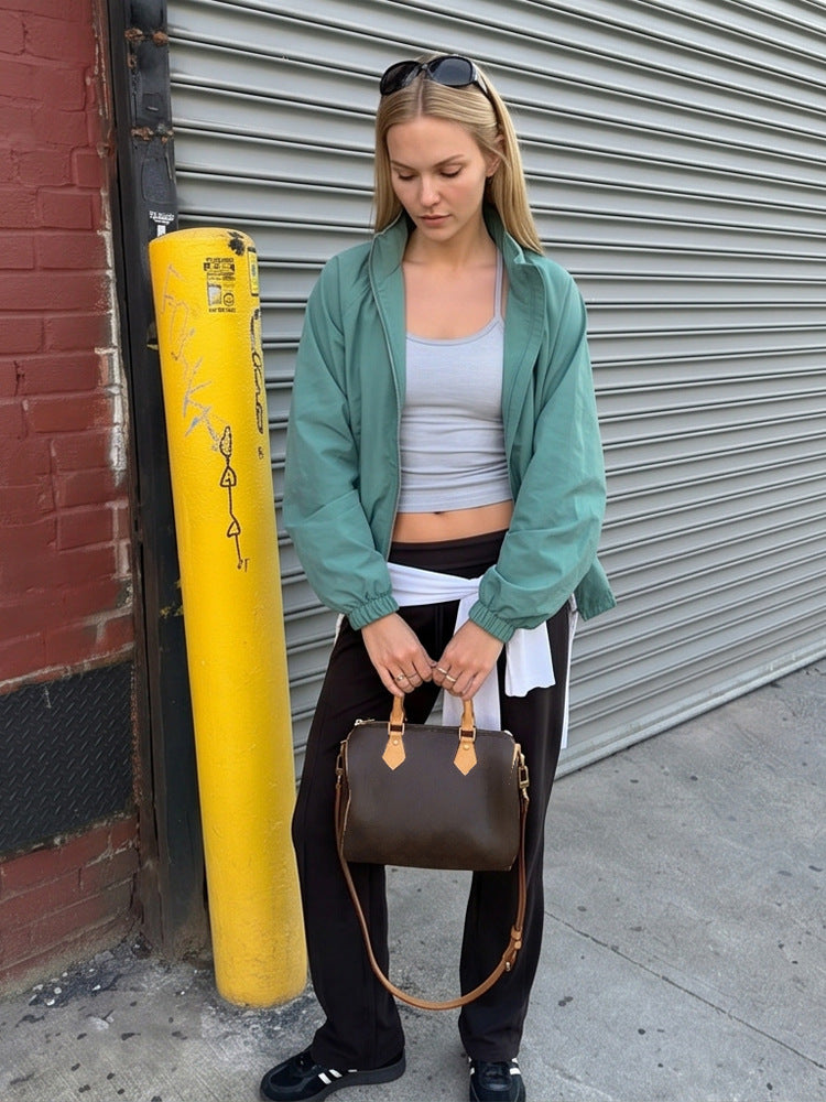 Damen Sportlich-urbaner Windbreaker mit kurzem Cropped-Schnitt, hohem Stehkragen und elastischen Bündchen Nord Taschen