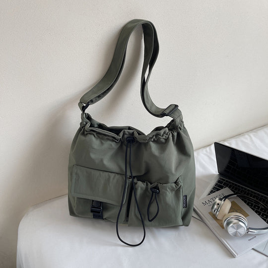 Damen Umhängetasche mit verstellbarem Kordelzug und praktischen Taschen Nord Taschen