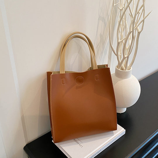 Damen elegante Handtasche mit strukturiertem Design und abnehmbaren Tragehenkeln Nord Taschen