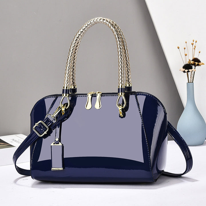 Damen elegante Handtasche mit strukturierter Oberfläche und goldfarbenem Tragegriff Nord Taschen