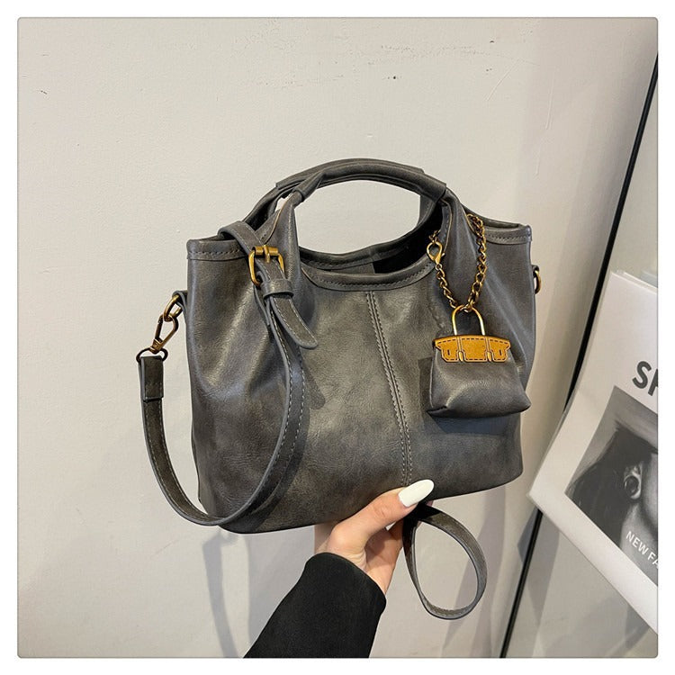 Damen elegante Handtasche mit abnehmbarem Charm Nord Taschen