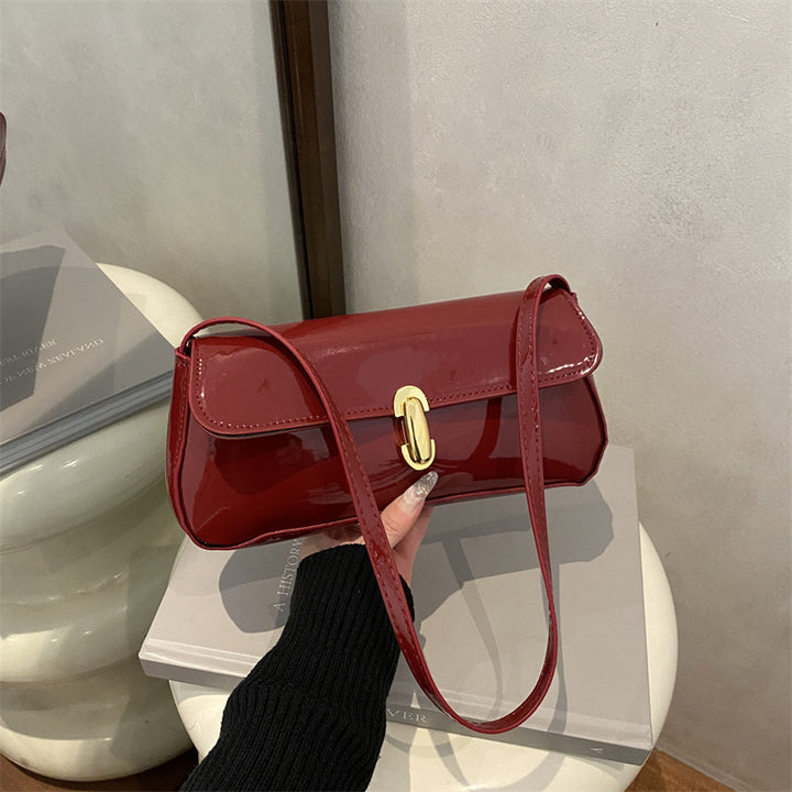 Damen elegante Umhängetasche mit luxuriösem Hochglanzdesign und praktischen Tragegriffen Nord Taschen