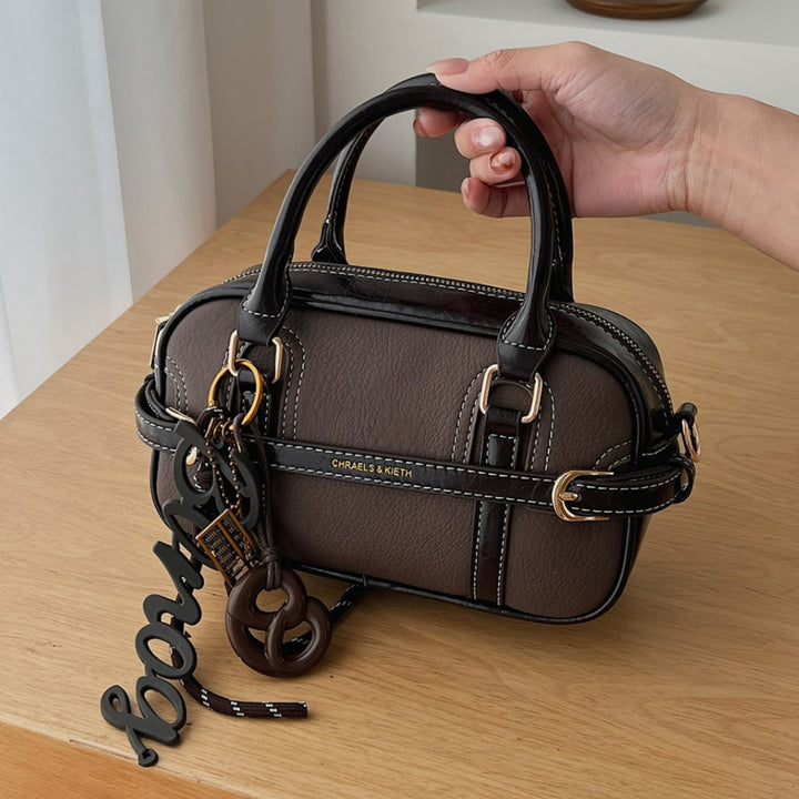 Damenhandtasche mit abnehmbarem Schultergurt und eleganten Details Nord Taschen