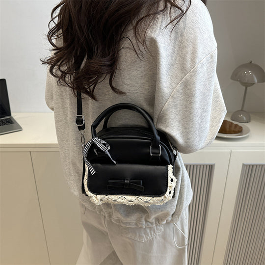 Damen Mini-Handtasche mit verspieltem Schleifenakzent und floralen Details Nord Taschen