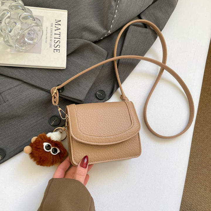 Damen praktische Mini-Umhängetasche mit verspieltem Anhänger Nord Taschen
