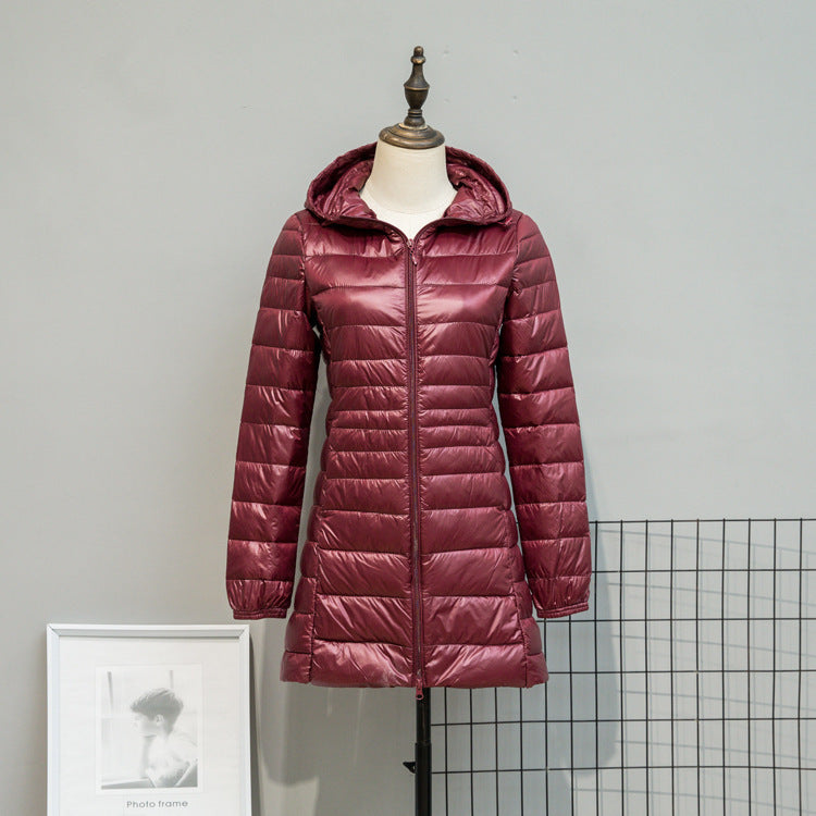 Damen Leicht gesteppte Langjacke mit Kapuze und schlanker Silhouette Nord Taschen