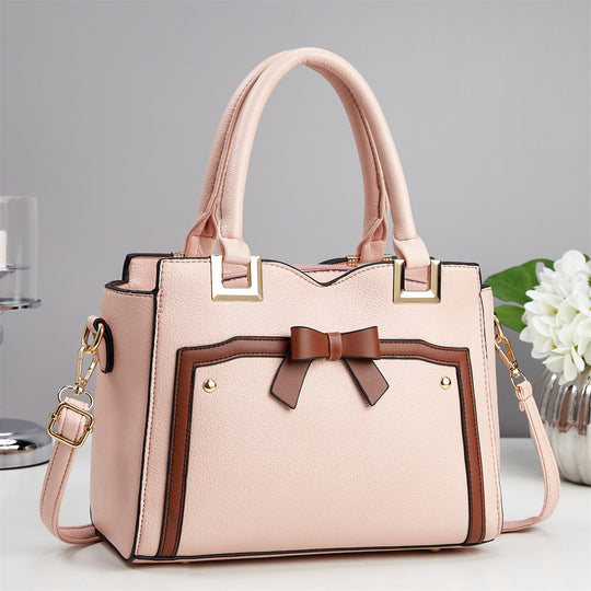 Damen elegante Handtasche mit schimmerndem Schleifendetail und abnehmbarem Schulterriemen Nord Taschen