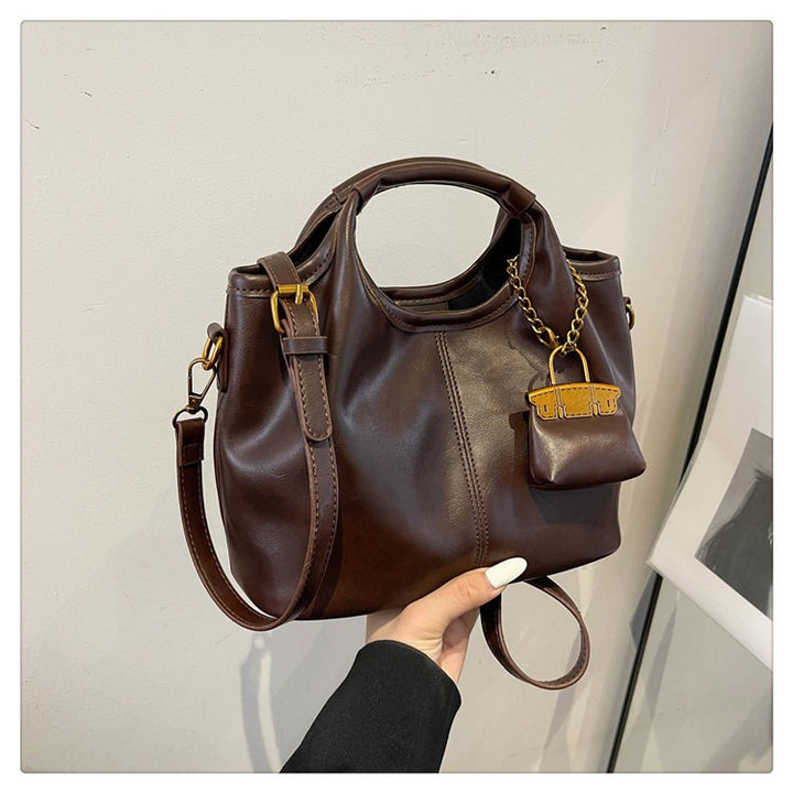 Damen elegante Handtasche mit abnehmbarem Charm Nord Taschen