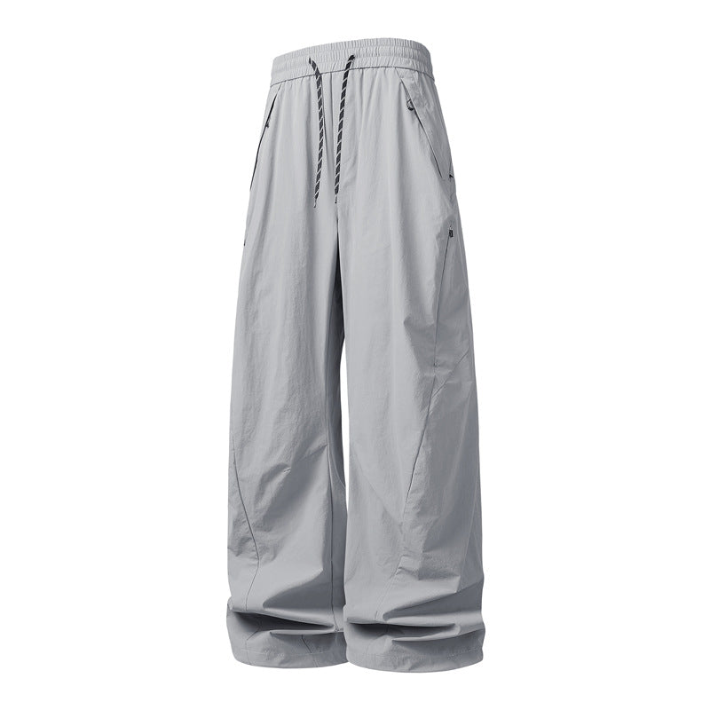 Unisex Weite Tech-Baggy-Hose mit elastischem Kordbund, Reißverschlusstaschen & wasserabweisender Nylonoptik Nord Taschen
