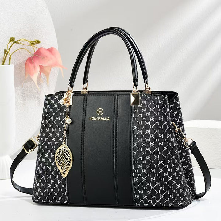 Damen elegante Handtasche mit luxuriösem Monogramm und abnehmbarem Schulterriemen Nord Taschen