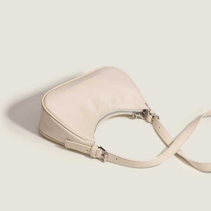 Damen Umhängetasche mit glänzender Oberflächenstruktur und einzigartigem Design Nord Taschen