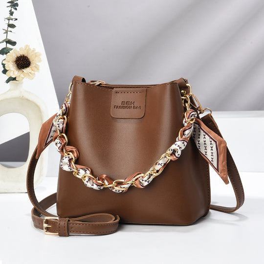 Damen Bucket-Handtasche mit modischer Kettenverzierung und abnehmbarem Schal Nord Taschen