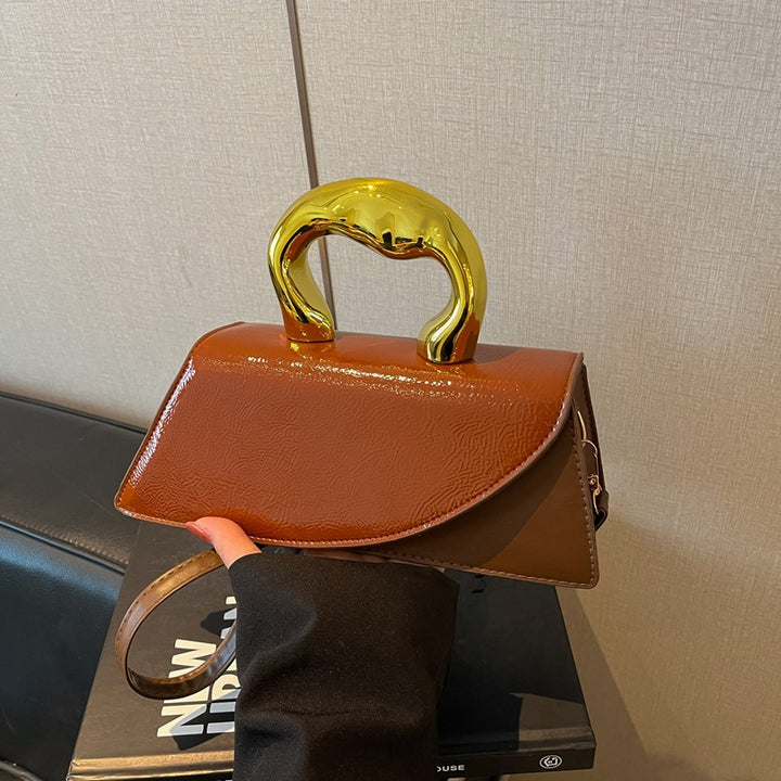Damen Handtasche mit elegantem Goldgriff Nord Taschen