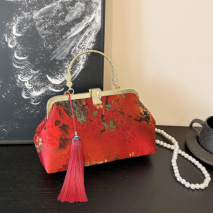 Damen Clutch-Tasche mit floralem Design und elegantem Kettenakzent Nord Taschen