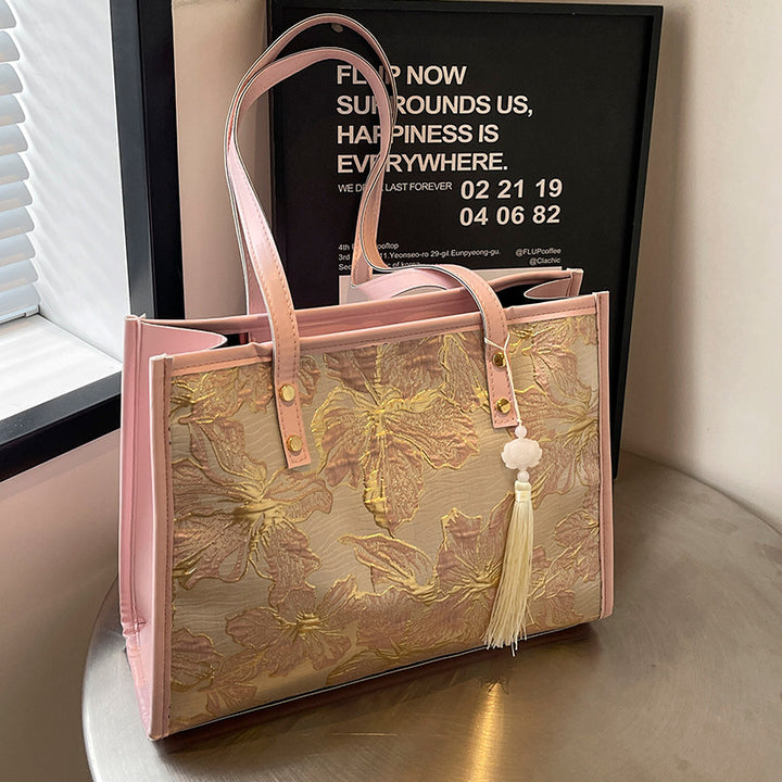 Damen Tragetasche mit floralem Stickdesign und elegantem Quastenanhänger Nord Taschen