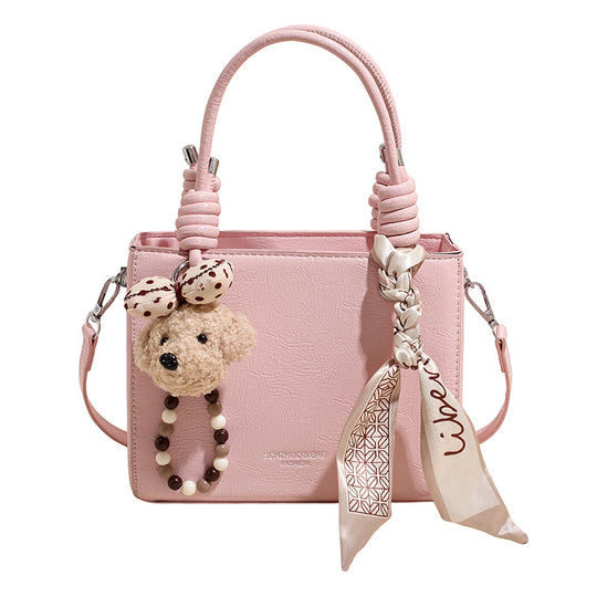 Damen Handtasche mit integriertem Tragegurt und geflochtenen Details Nord Taschen