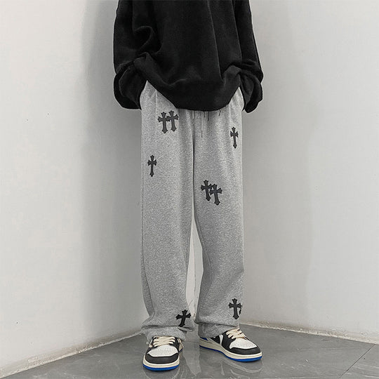 Herren weite Baumwoll-Jogginghose mit Allover-Kreuzprint und elastischem Tunnelzugbund Nord Taschen