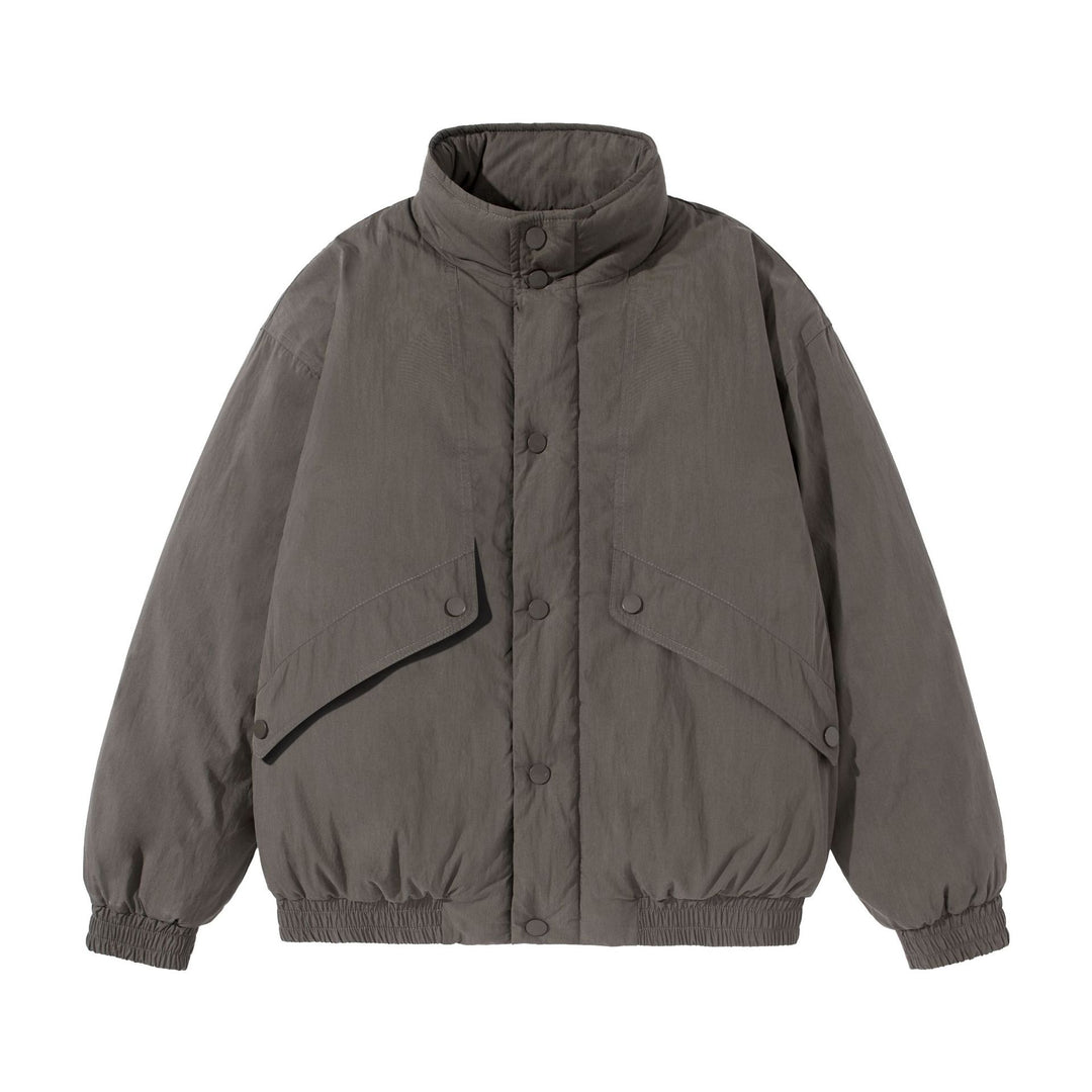 Unisex Kurz geschnittene gesteppte Boxy‑Blousonjacke mit hohem Stehkragen und Utility‑Flaptaschen Nord Taschen